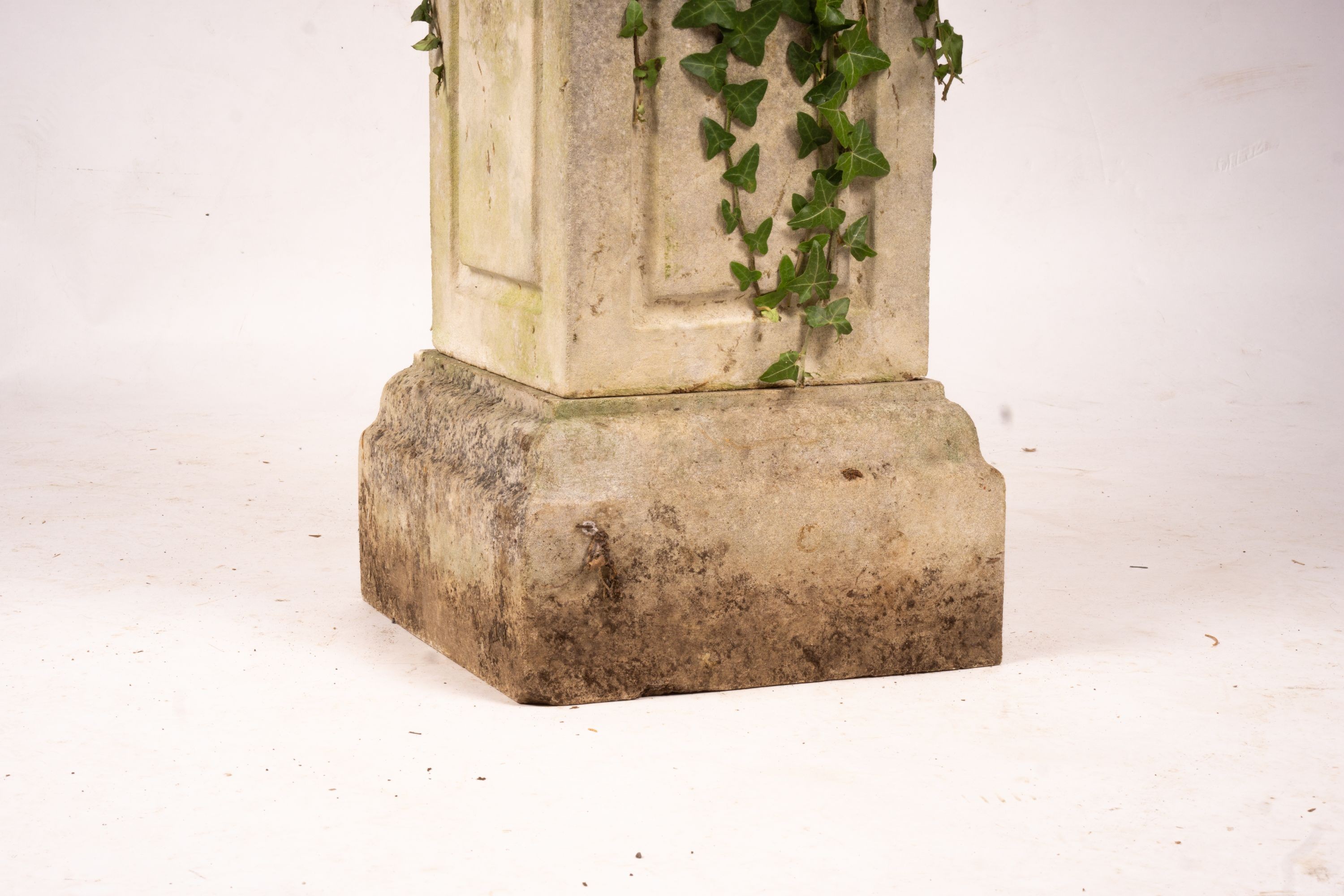 A reconstituted stone garden bird bath combined sundial on square pedestal base, height 108cm